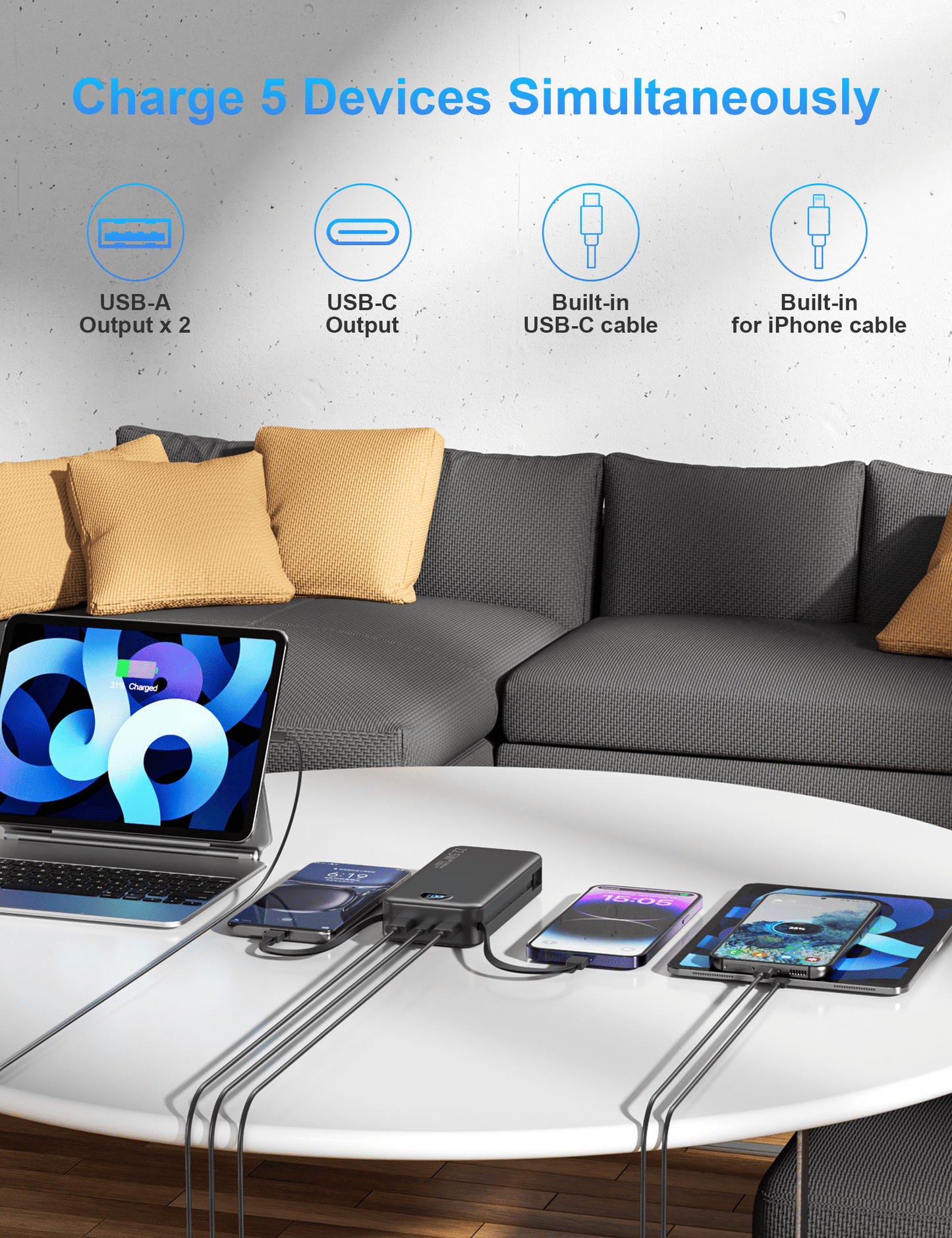 power bank charging five devices at once including laptop tablet and smartphones using multiple built‑in and external ports
